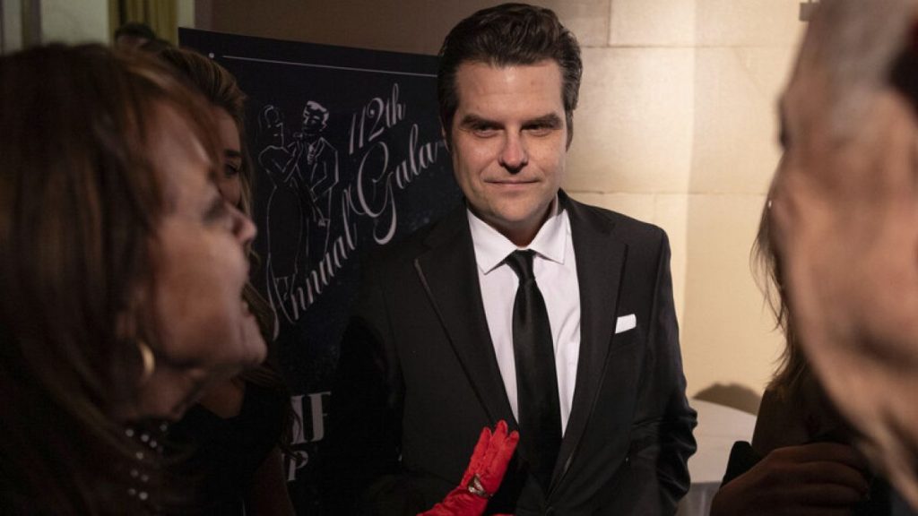 Former Rep. Matt Gaetz, R-Fla., center, attends the cocktail hour of New York Young Republican Club