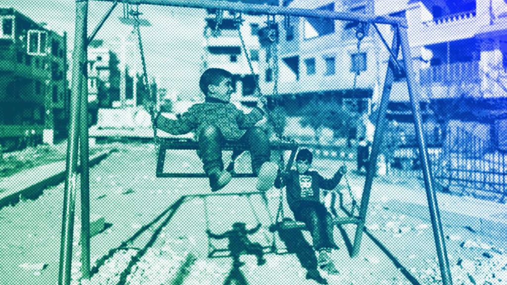 Children play in the town of Harasta, which saw fierce fighting during the war between opposition forces and the Assad regime, on the outskirts of Damascus, January 2025