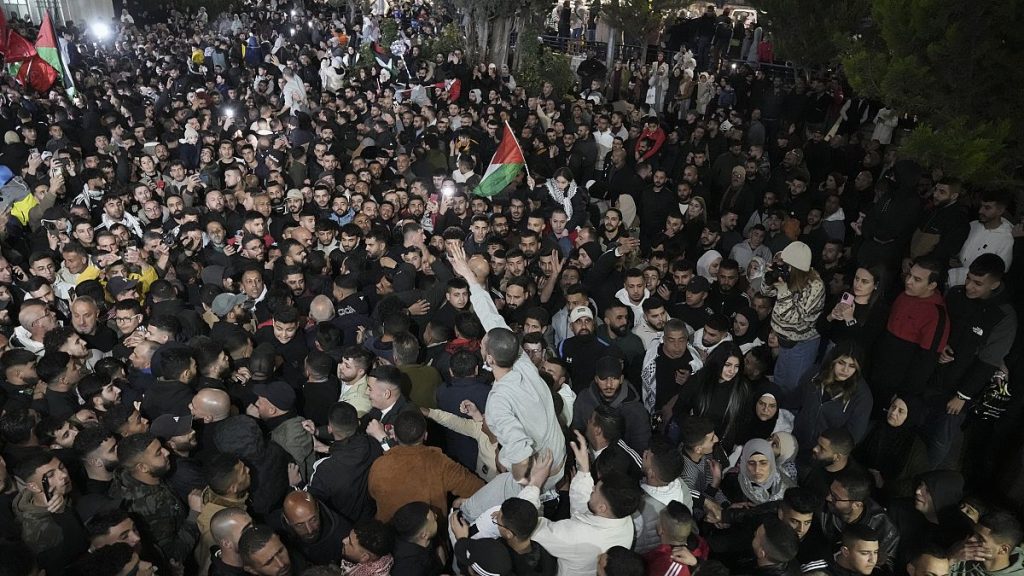 Crowds greet Palestinian prisoners after being released from Israeli prison in the West Bank city of Ramallah, 30 January, 2025