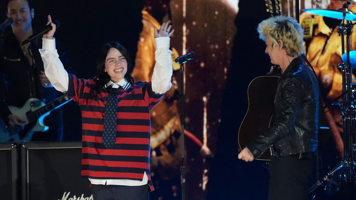 Billie Eilish, left, performs with Billie Joe Armstrong of Green Day during the FireAid benefit concert on 30 January 2025.