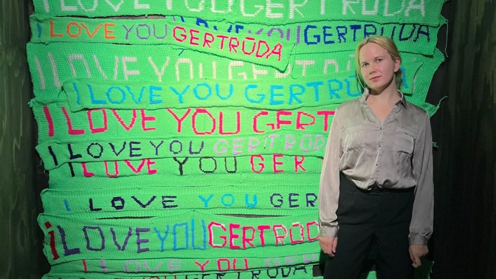 Gertrūda Gilytė and her scarves, displayed at a recent exhibition.