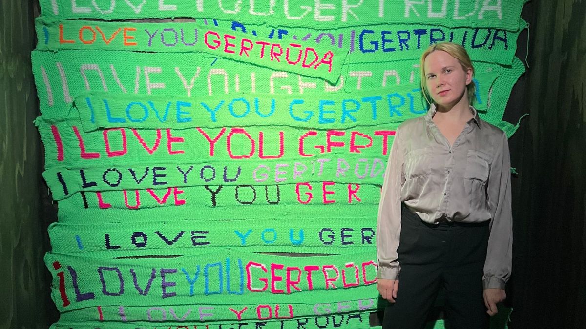Gertrūda Gilytė and her scarves, displayed at a recent exhibition.