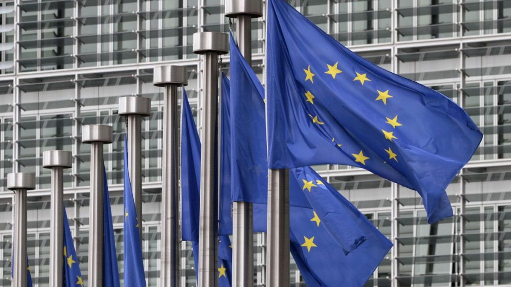 File picture of EU flags flying outside the European Commission headquarters in Brussels
