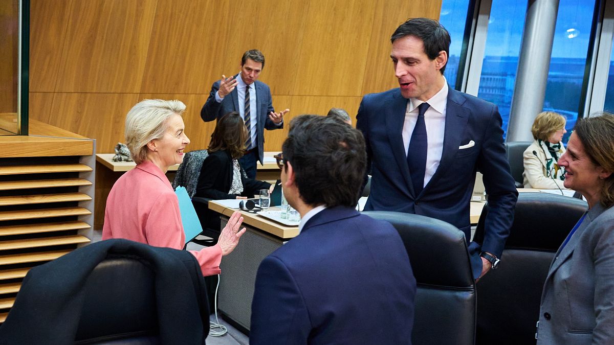 Commission president Ursula von der Leyen jokes with climate commissioner Wopke Hoekstra and voice-president Teresa Ribera, whose portfolio include competitiveness, 29 January