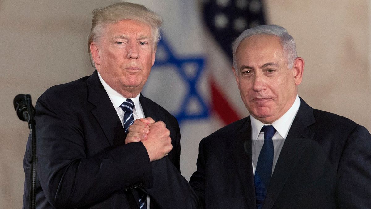 FILE - President Donald Trump and Israeli Prime Minister Benjamin Netanyahu shake hands at The Israel Museum in Jerusalem, 23 May 2017.
