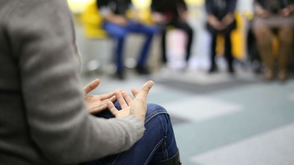People in a therapy group.