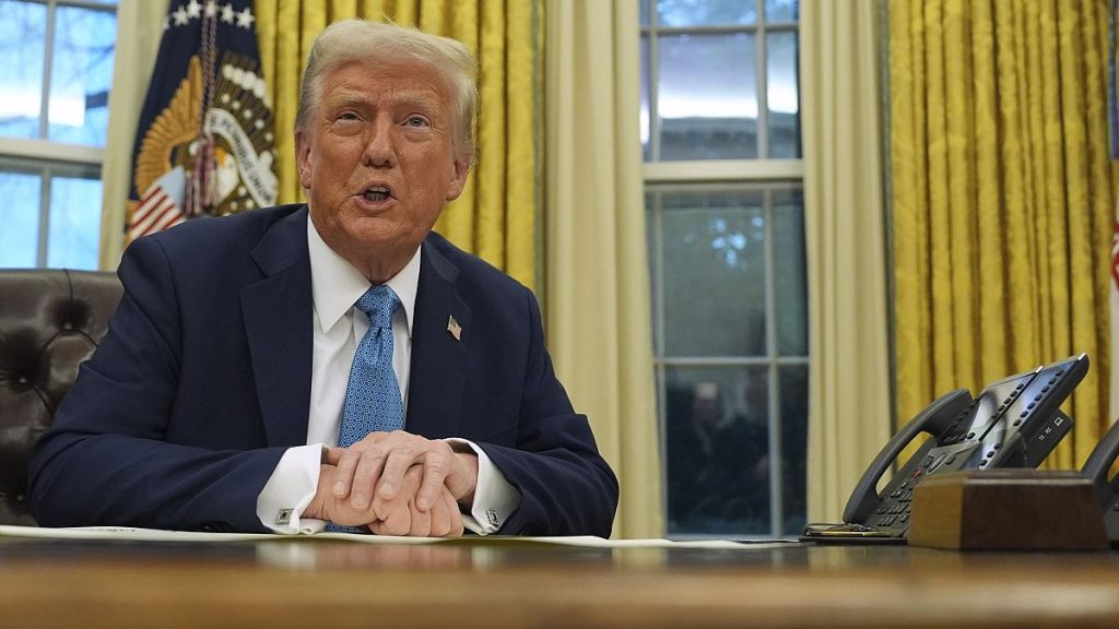 President Donald Trump speaks to reporters as he signs executive orders in the White House, 31 January, 2025