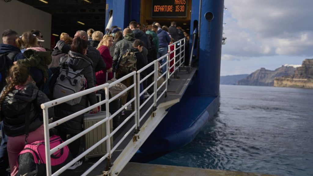 Passengers board a regularly scheduled ferry to Athens