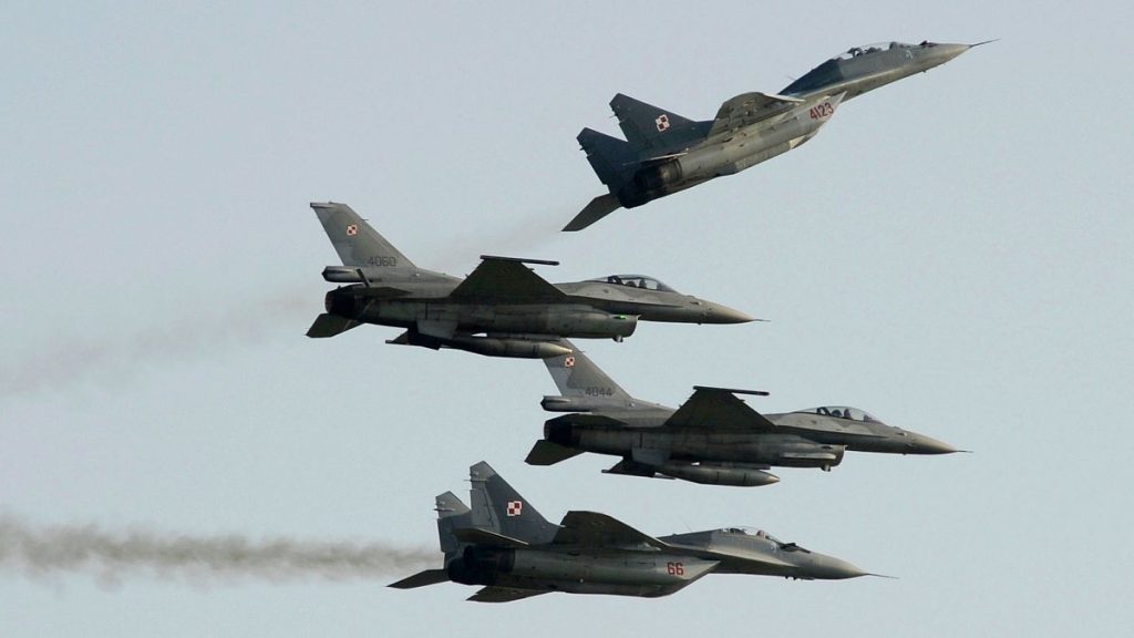 Two Russian-made Mig 2s (above) and two US-made F-16