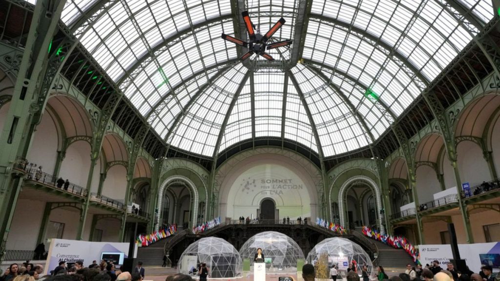 Audience members attend the opening ceremony of an Artificial Intelligence Action Summit at the Grand Palais in Paris, Monday, Feb. 10, 2025. (AP Photo/Michel Euler)
