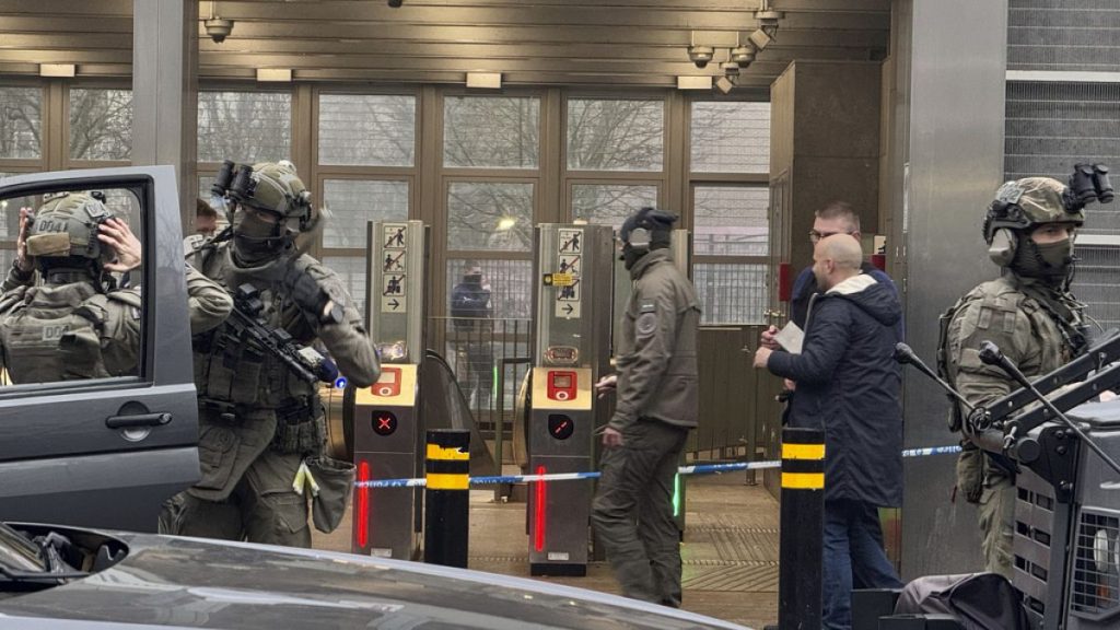 Police work in an area around the Clemenceau metro station after a shooting incident in Brussels, Wednesday, Feb. 5, 2025. (AP Photo/Sylvain Plazy)
