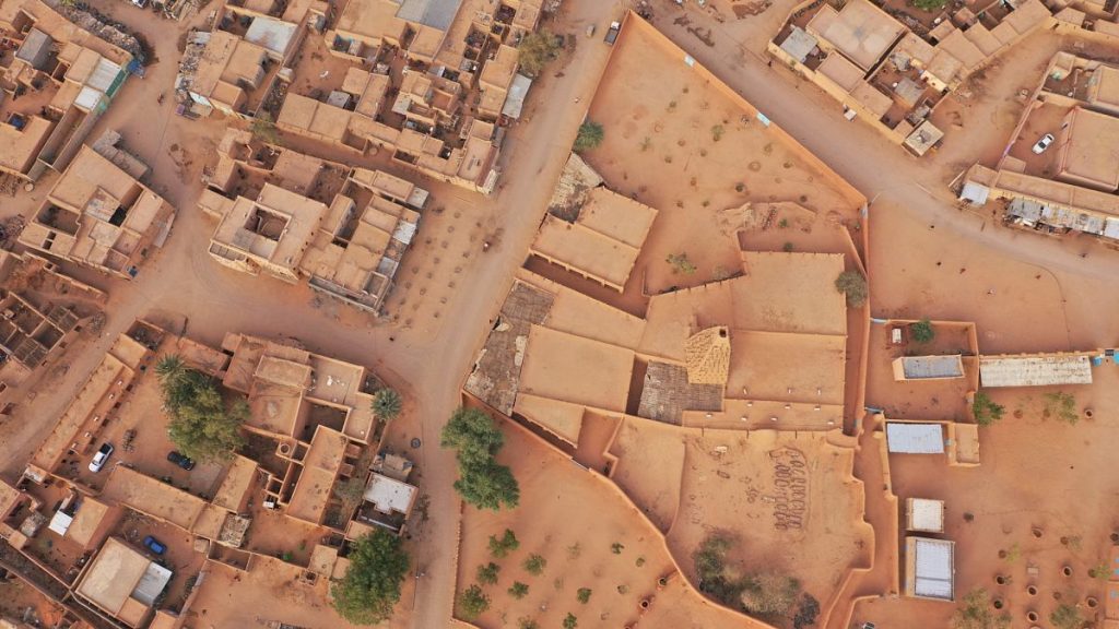 Aerial shot of the Agadez Mosque in Niger, under threat from the impacts of desertification and part of an existing project by HeritageWatch.AI partner Aliph.