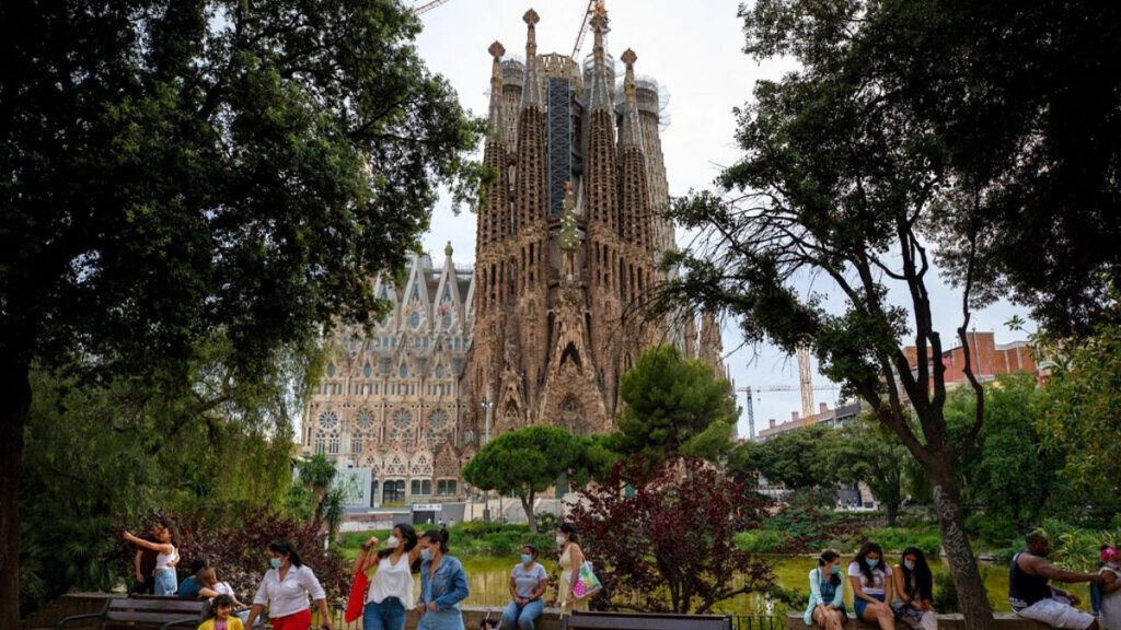 Local visitors enjoy a park next to Antoni Gaudí