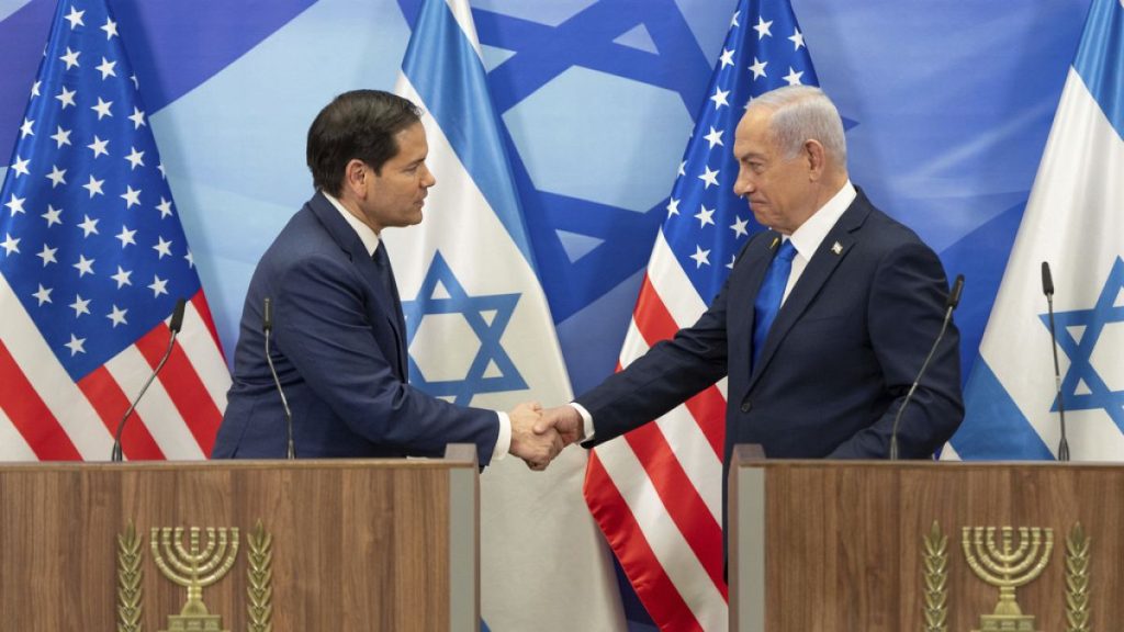 U.S. Secretary of State Marco Rubio and Israeli Prime Minister Benjamin Netanyahu shake hands during a news conference in Jerusalem, Israel, Sunday, Feb. 16, 2025