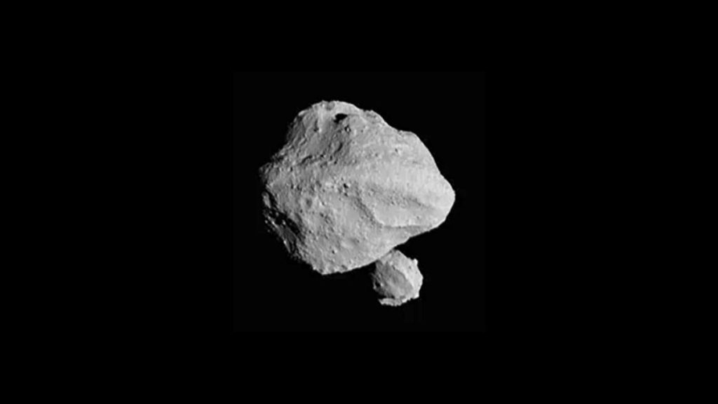 This photo provided by NASA shows a photo taken by the Lucy spacecraft during Wednesday, Nov. 1, 2023 flyby of asteroid Dinkinesh, 300 million miles from Earth