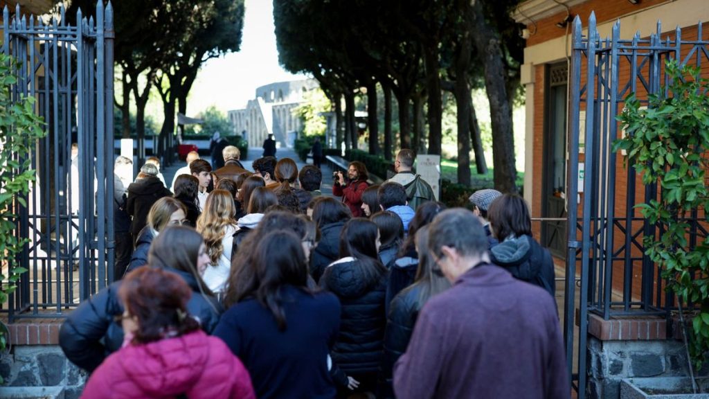 Visitors crowd the entrance of the Pompeii Archaeological Park, near Naples in southern Italy, 15 November 2024.