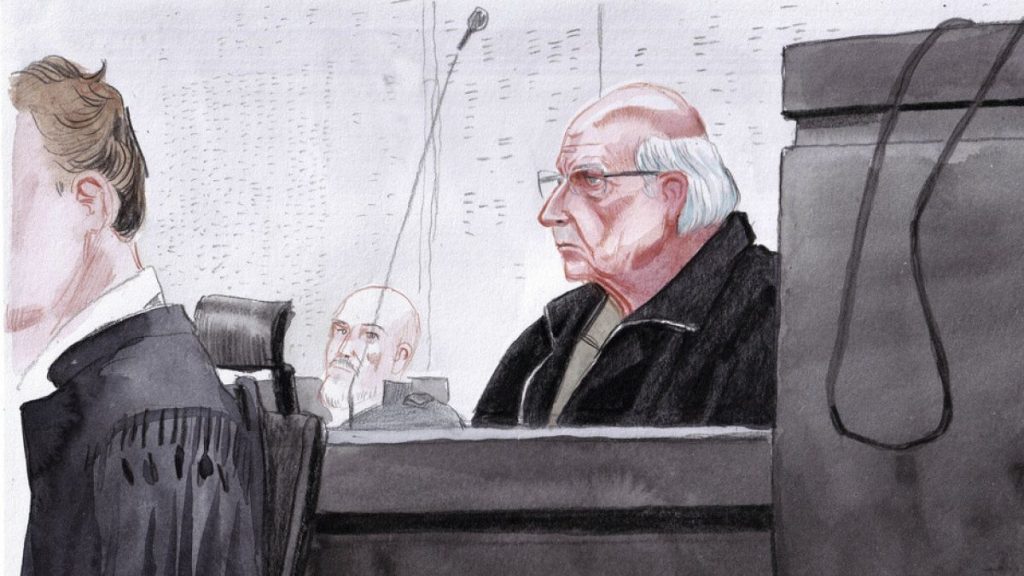 This courtroom sketch shows Joel Le Scouarnec, now 74, sitting in courtroom and accused of raping or abusing 299 people at the Vannes courthouse, France, Feb. 24, 2025