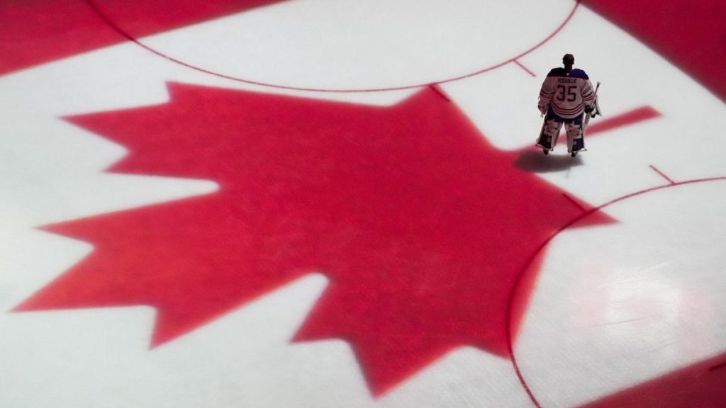 FILE: Edmonton Oilers goaltender Olivier Rodrigue stands on the ice before a preseason NHL hockey game against the Seattle Kraken, Wednesday, Oct. 2, 2024, in Seattle