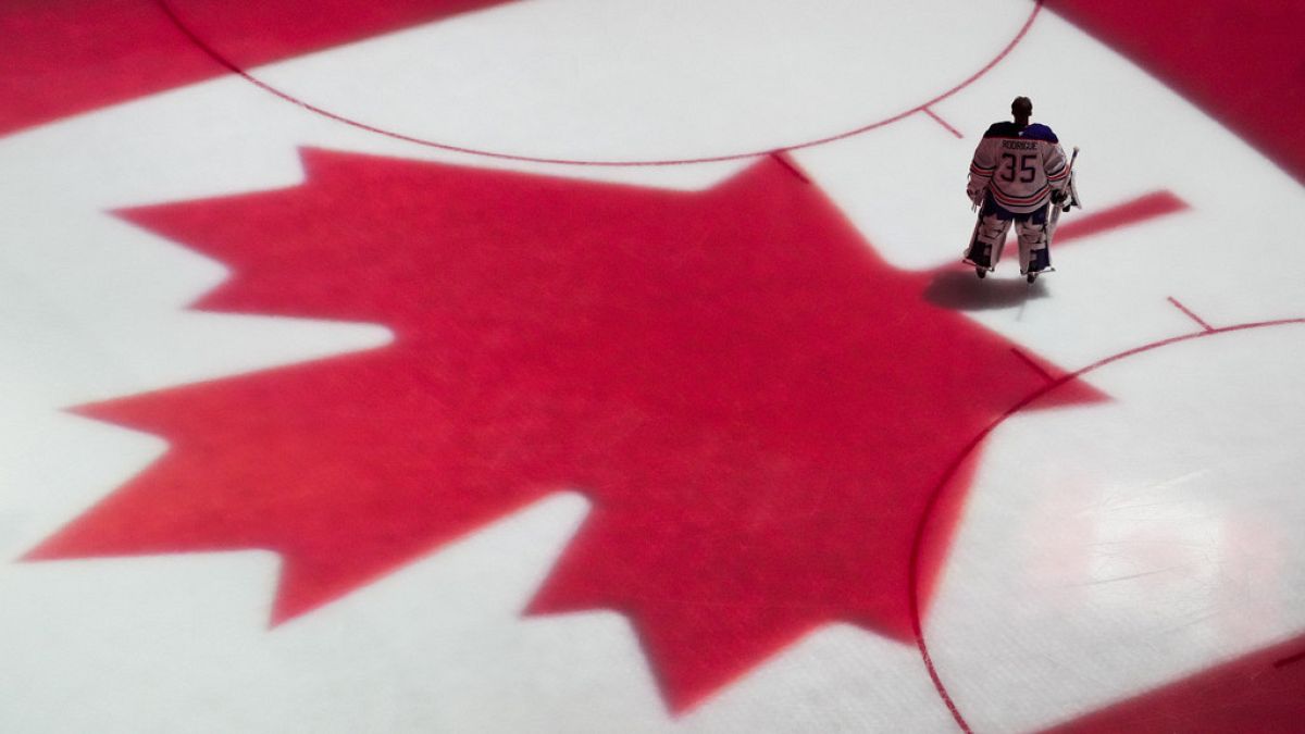 FILE: Edmonton Oilers goaltender Olivier Rodrigue stands on the ice before a preseason NHL hockey game against the Seattle Kraken, Wednesday, Oct. 2, 2024, in Seattle