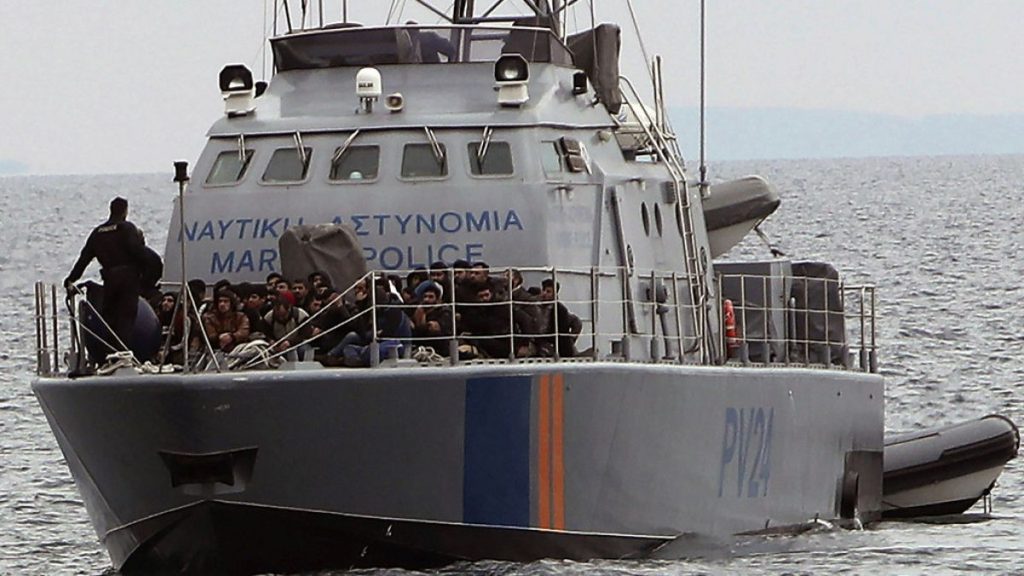 FILE: Migrants aboard a Cyprus marine police patrol vessel off the Mediterranean island nation