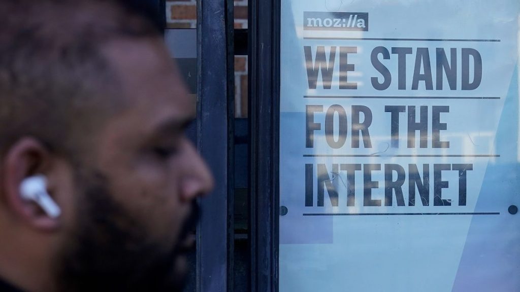 A pedestrian walks past a sign outside of a Mozilla office in San Francisco, Wednesday, April 12, 2023.