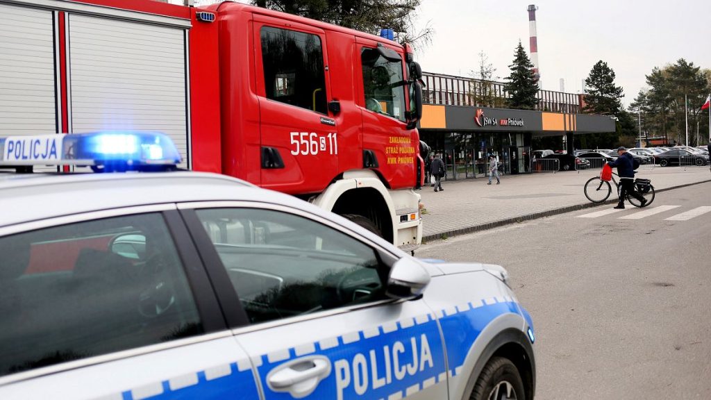 A Polish police car and fire engine.