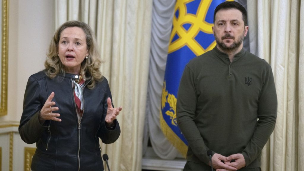 President of the European Investment Bank Nadia Calvino and Ukrainian President Volodymyr Zelenskyy attend their briefing in Kyiv, Ukraine, Monday, Feb. 10, 2025.