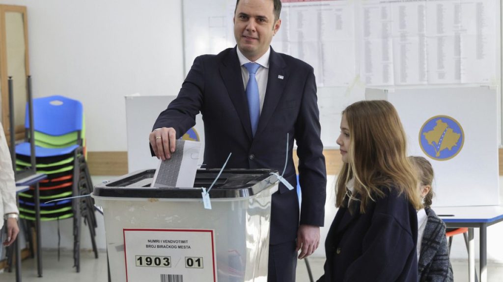 Lumir Abdixhiku, Leader of Democratic League of Kosovo party, casts his ballot during parliamentary election in Pristina, Kosovo, Sunday, Feb. 9, 2025. (AP Photo/Vlasov Sulaj)