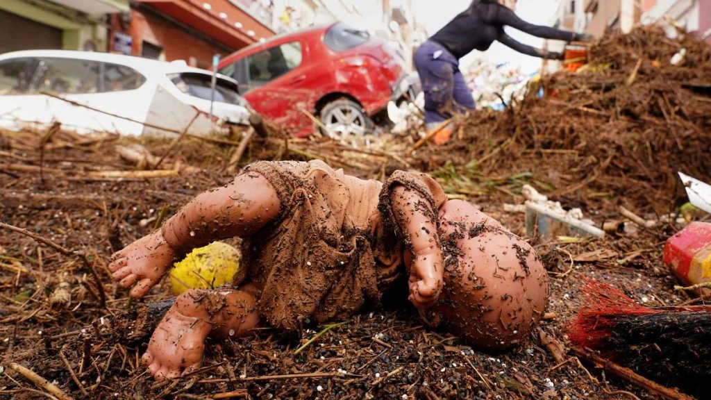 A doll is photographed after being swept away by floods in Valencia, Spain, Wednesday, Oct. 30, 2024.