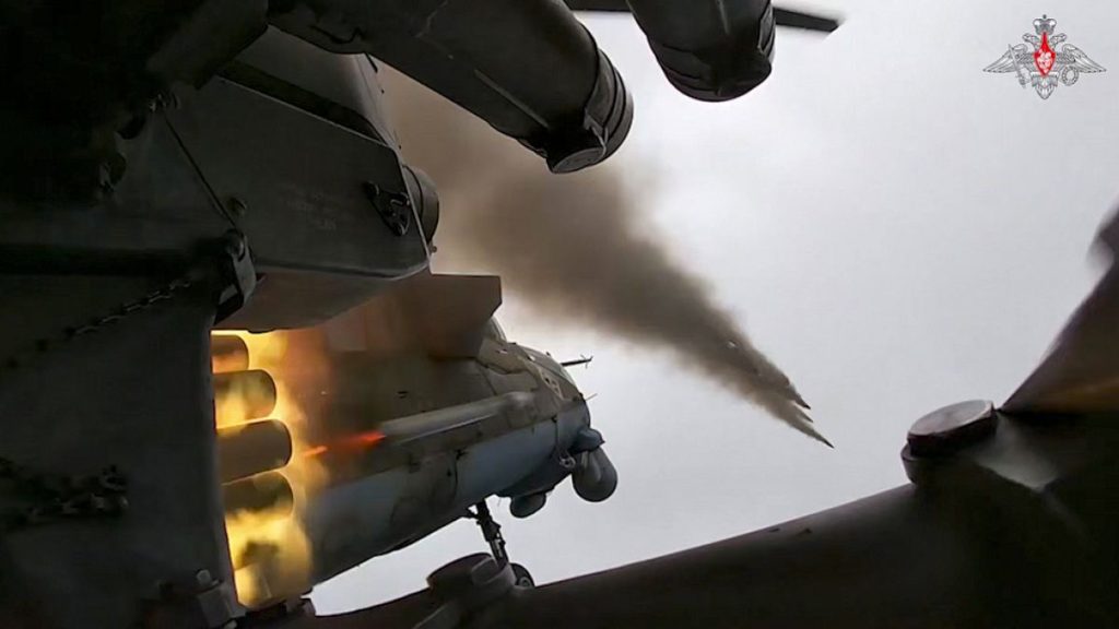 FILE - Russian MI-35M helicopter launches rockets toward Ukrainian position in the Russian - Ukrainian border area in the Kursk region, Russia, Jan 23 2025