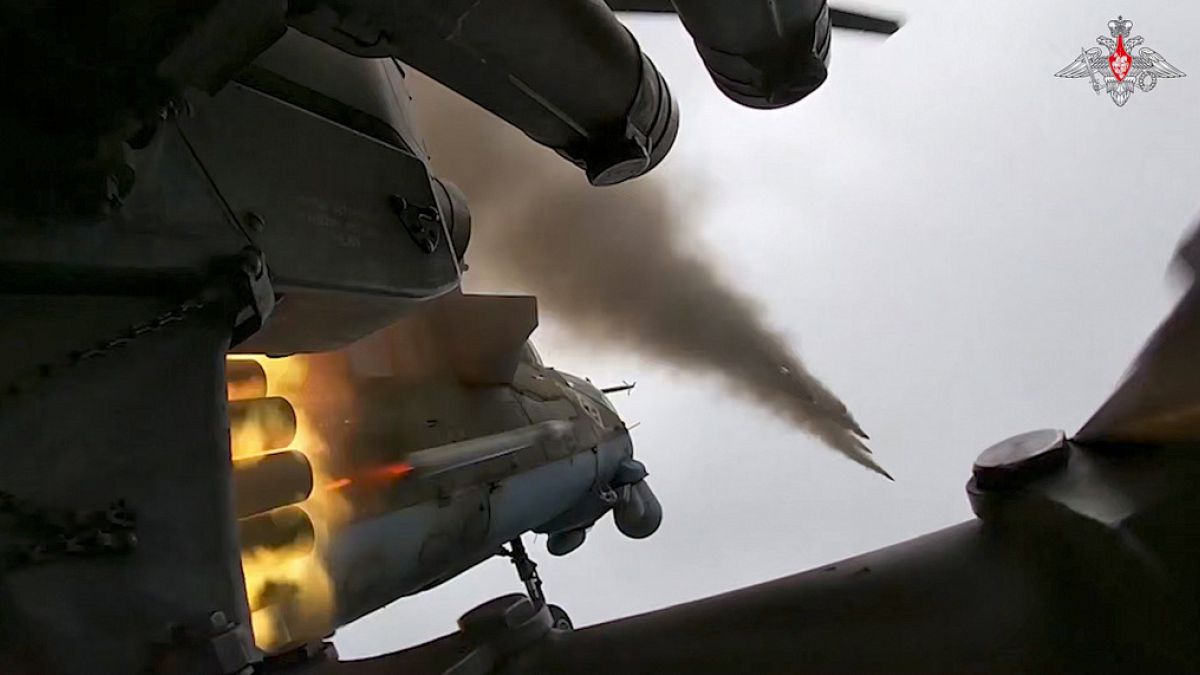 FILE - Russian MI-35M helicopter launches rockets toward Ukrainian position in the Russian - Ukrainian border area in the Kursk region, Russia, Jan 23 2025