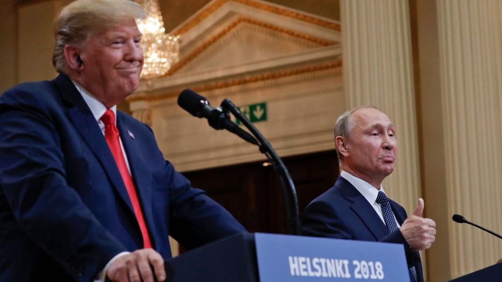 FILE: Russian President Vladimir Putin and US President Donald Trump give a joint news conference at the Presidential Palace in Helsinki, 16 July 2018