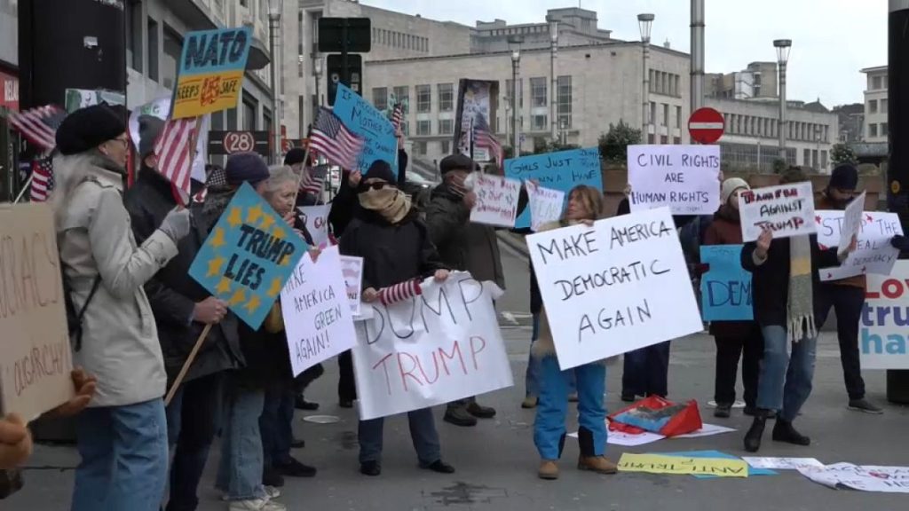 Demonstrators gathered in front of the Central Station in Brussels, Belgium to protest against US President Donald Trump