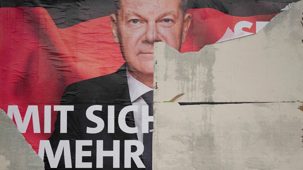 A damaged election poster showing German Chancellor Olaf Scholz is displayed on a road in Wernigerode, 26 January 2025