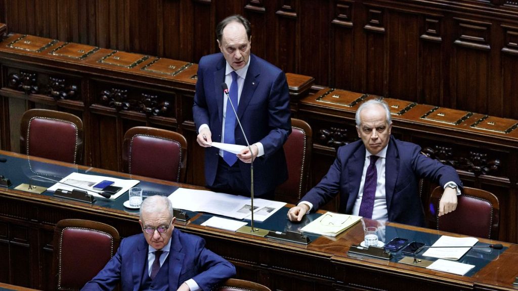 Cabinet Minister Luca Ciriani, left back, speaks during Question Time in the Chamber of Deputies in Rome.