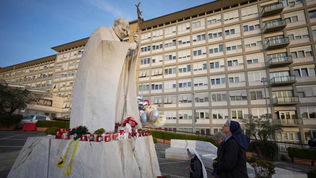 Nuns pray for Pope Francis in front of the Agostino Gemelli Polyclinic, in Rome, Sunday, Feb. 23, 2025, where the Pontiff has been hospitalized since Friday, Feb. 14.