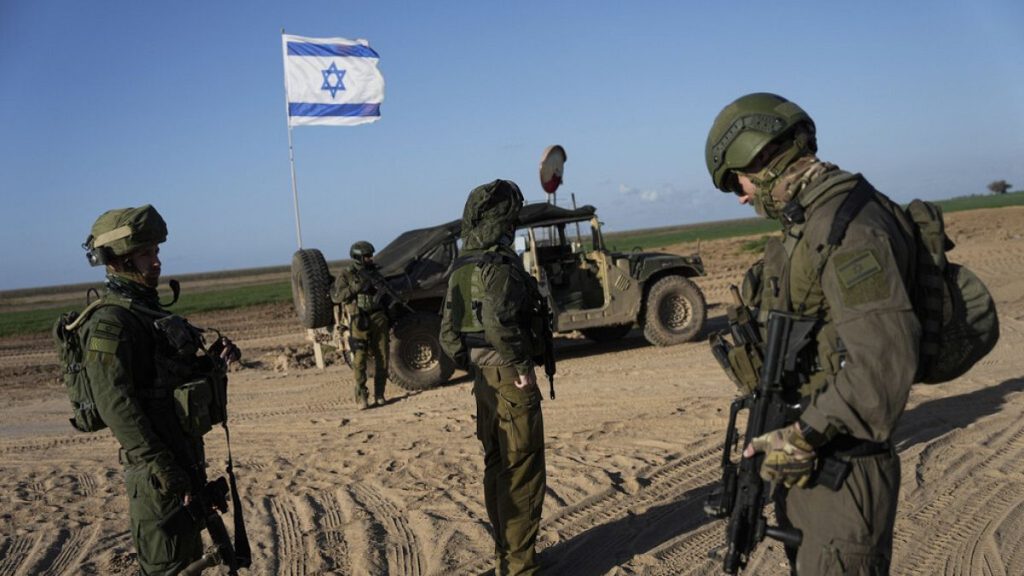 FILE: Israeli soldiers are seen near the Gaza Strip border in southern Israel, Monday, March 4, 2024.