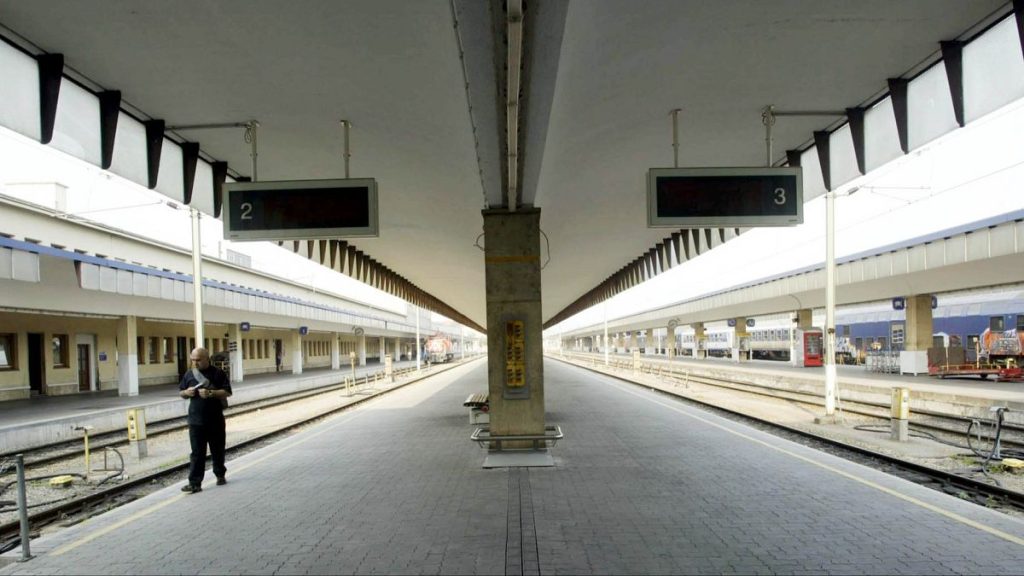 FILE: A man walks along the tracks at Vienna