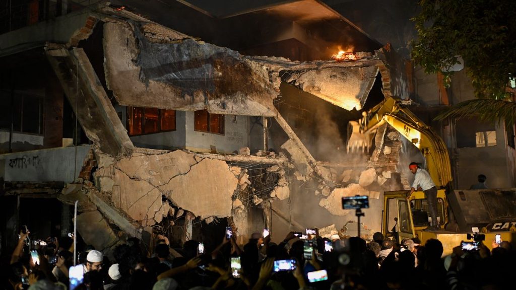 Demonstrators destroy Sheikh Hasina