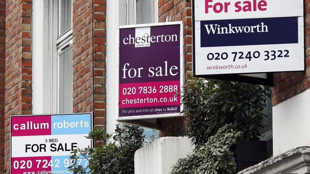 For sale signs outside properties in west London