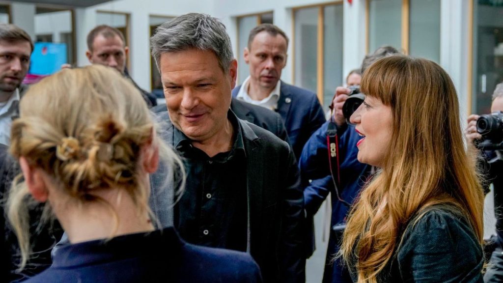 The German Green Party’s candidate for chancellor, Robert Habeck, centre, is stepping down from a leadership role after his party’s defeat.