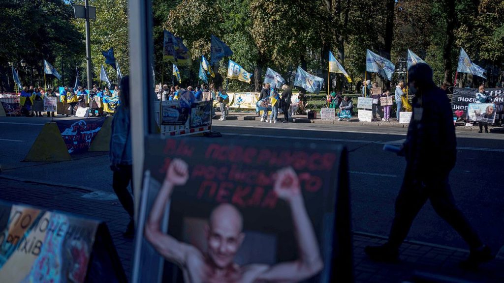 Family members of Ukrainian POWs support soldiers who defended Mariupol and are still in Russian captivity after two and half years, in Kyiv, 9 October 2024