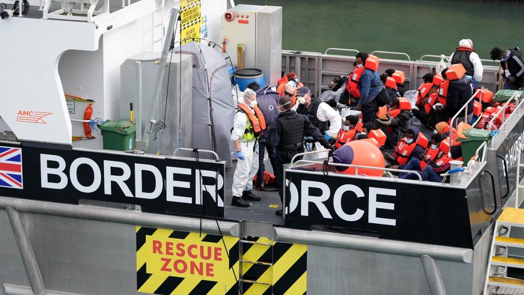 People thought to be migrants who made the crossing from France are brought into port after being picked up in the Channel by a British border force vessel.