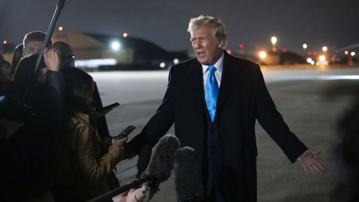 U.S. President Donald Trump speaks to reporters next to Air Force One on 2 February 2025.