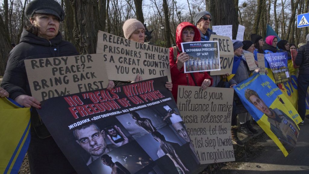 People attend a rally addressed to the US government, asking for help in freeing Ukrainian prisoners of war held captive in Russia, in front of the U.S. Embassy in Kyiv.