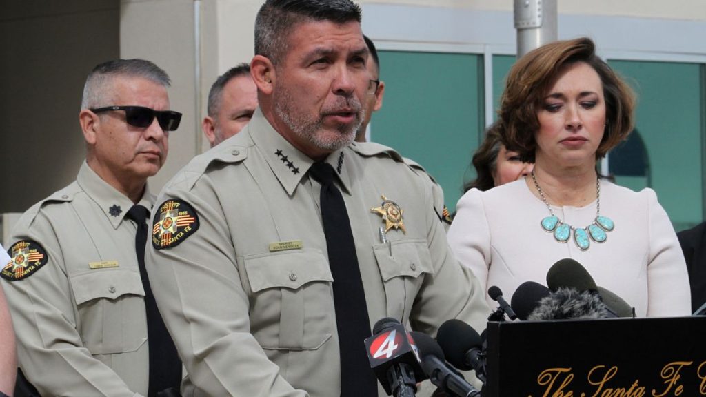 Santa Fe County Sheriff Adan Mendoza (center) answers questions about the investigation into the deaths - 7 March 2025