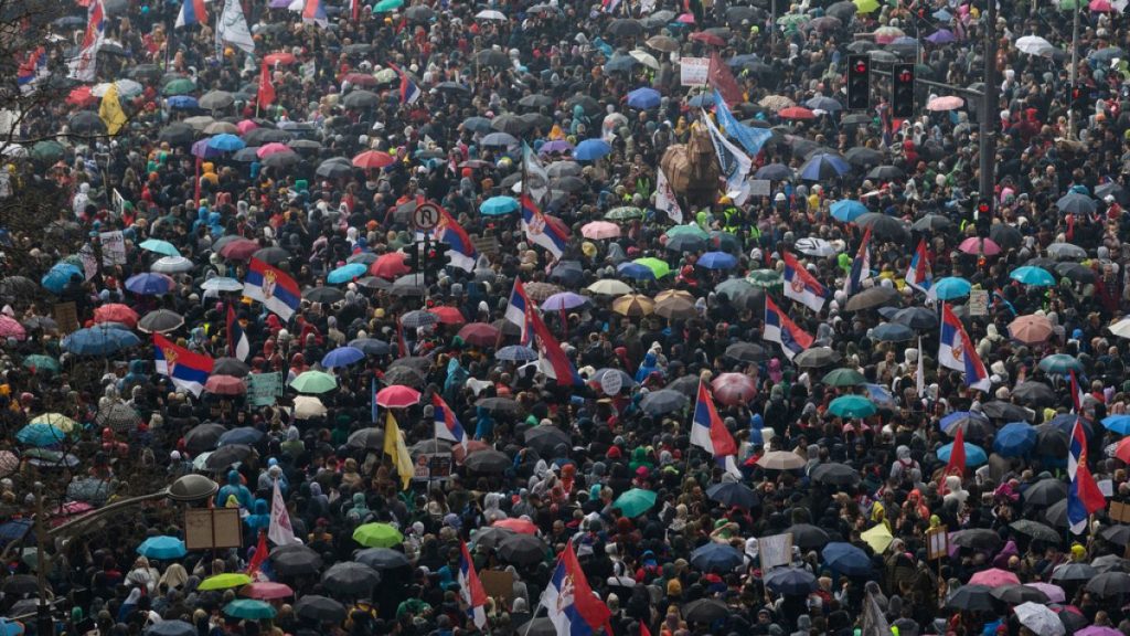 People gather in front of the Serbian parliament during a major anti-corruption rally led by university students in Belgrade, Serbia, Saturday, March 15, 2025.