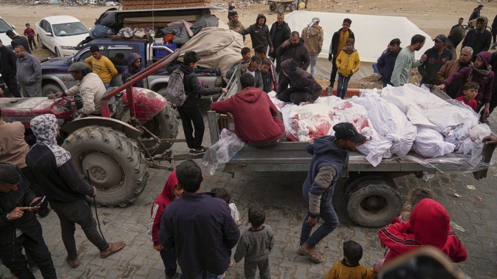 The bodies of victims of an Israeli army air strike are prepared for burial at Indonesia Hospital in Beit Lahia, 20 March, 2025