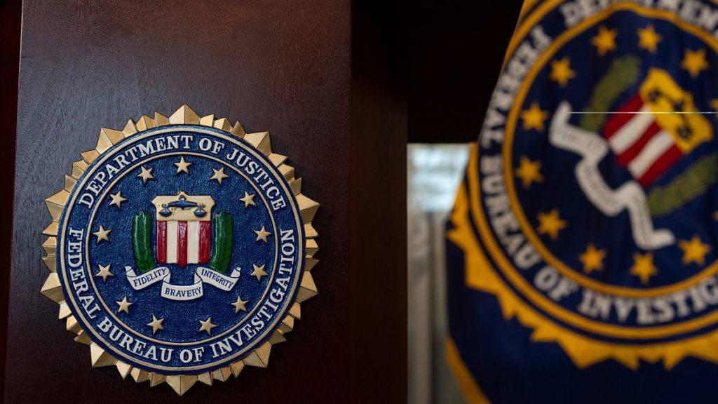 An FBI seal is displayed on a podium before a news conference at the field office in Portland, 16 January, 2025