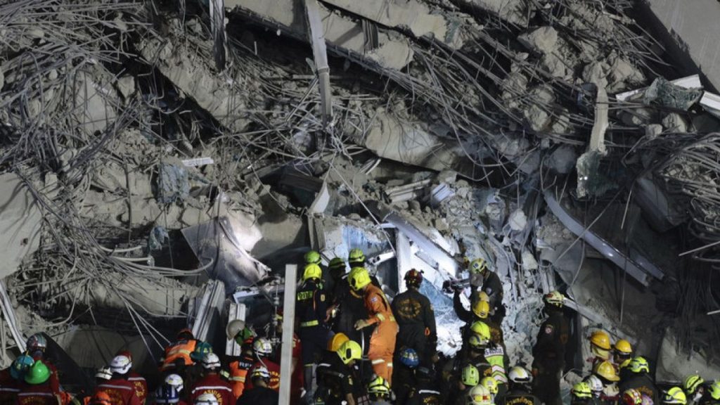 Rescuers work at the site of a high-rise building under construction that collapsed after a 7.7 magnitude earthquake in Bangkok, Thailand, early Saturday, March 29, 2025